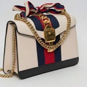 Gucci Cream, Black, and Red Shoulder Bag with Gold Chain.